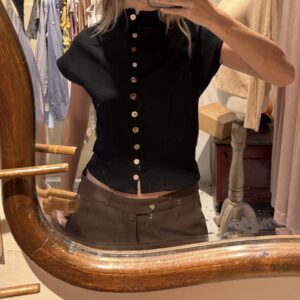 Black multi-buttoned top