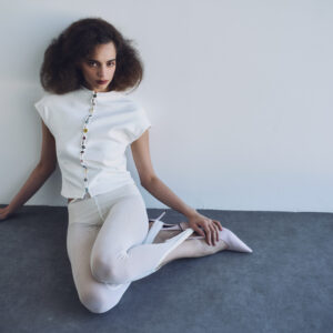 White multi-buttoned top
